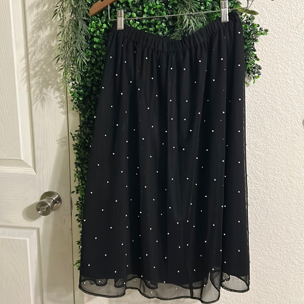 black skirt with pearls